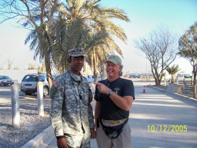 Major Messing poses with an Iraqi Army soldier assigned as an escort and guide.