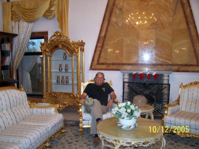 Major Messing relaxes in the guest room in one of Saddam's palaces assigned by the US Army.